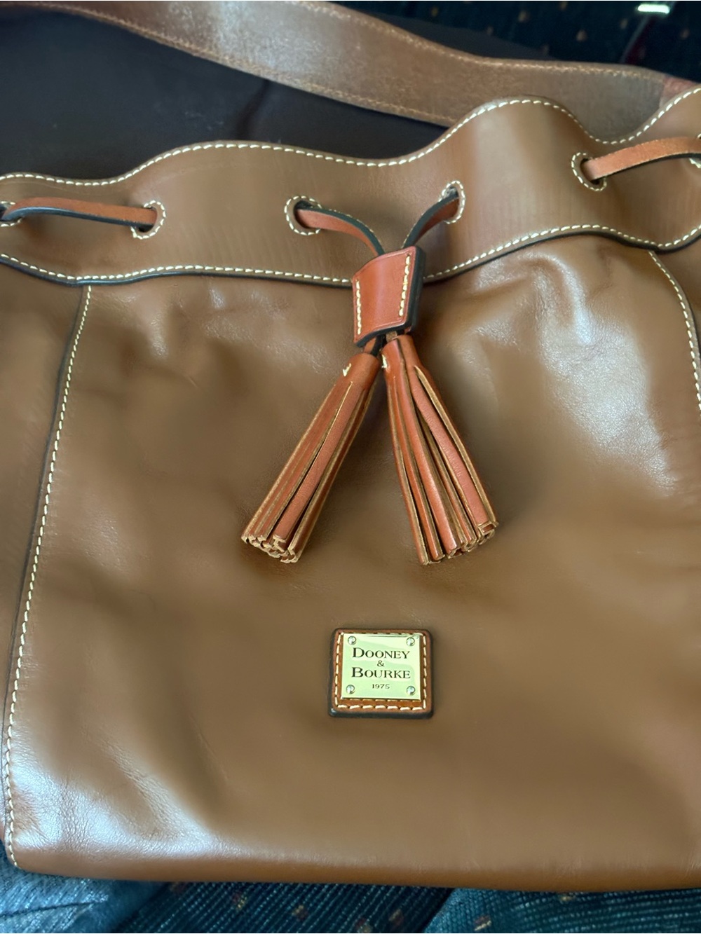 Dooney & Bourke Brown Leather Tassel Drawstring Shoulder Bag